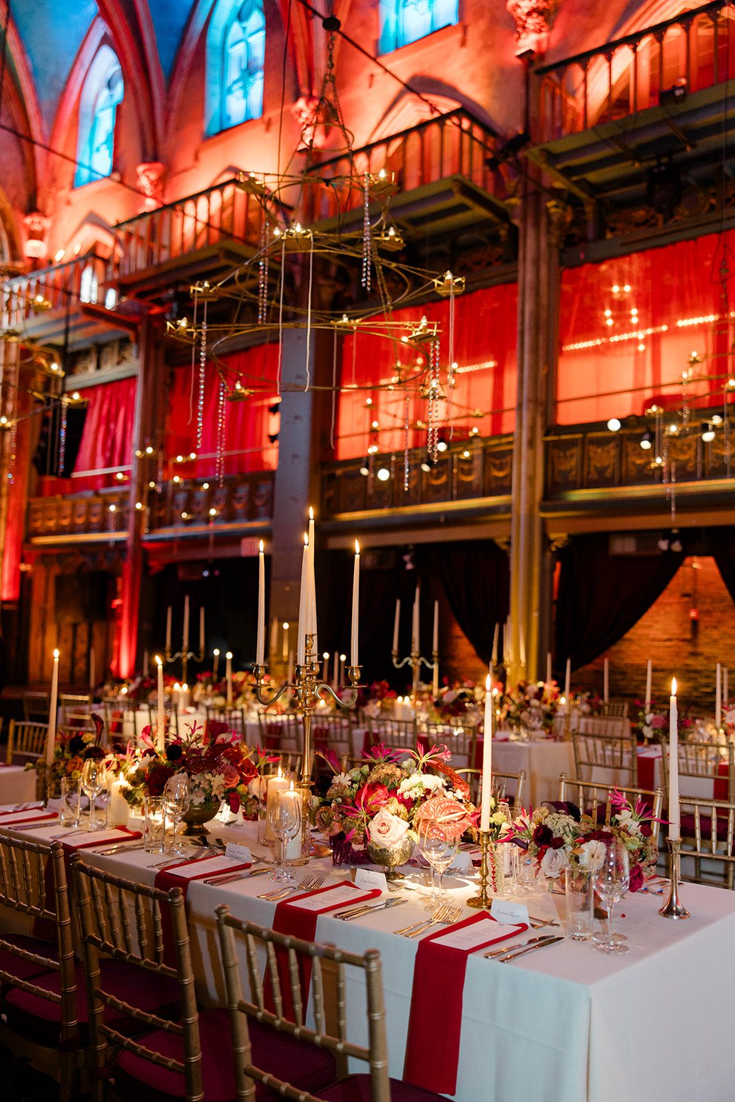 Long tables beneath the balconies